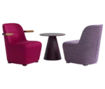 Bla Station Jackson table and Jackson lounge chairs in different upholstery, featuring curved backrests and armrests.