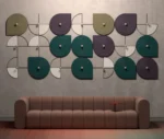 Bla Station Decofunc acoustic panels in assorted colours installed above BOB sofa in lounge setting.