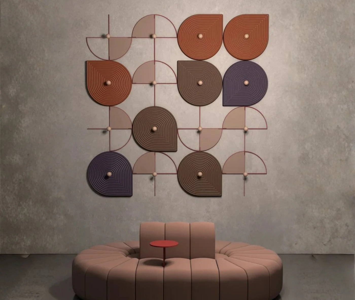 Bla Station Decofunc acoustic panels in assorted colours installed above BOB 360 sofa in lounge setting.