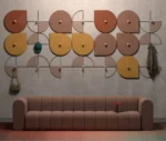 Bla Station Decofunc acoustic wall panels in front view with assorted colours in lounge setting.