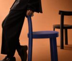 Bla Station Frankfurter chairs in black and blue timber finish in a studio setting.