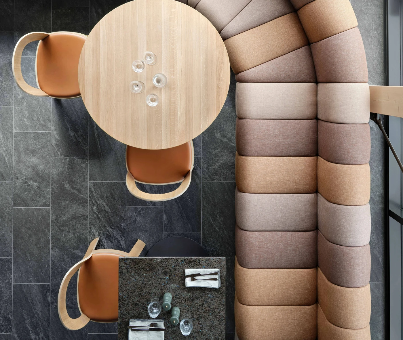 Top view of Bla Station BOB sofa and OM chairs in a hospitality setting featuring timber frames and upholstered seats and backrests.