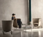 Bla Station Pocket lounge chairs in assorted upholstered design and under-seat storage in a lounge setting.