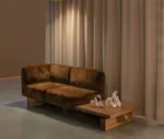 Bla Station RUT modular sofa with brown upholstery in a lounge setting.