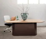 NEATT Petra occasional table front view of timber tabletop and sculptural pedestal base in a studio setting.