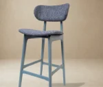 P4 Annalisa S2 stool in studio setting, dark upholstered seat and backrest in timber frame.