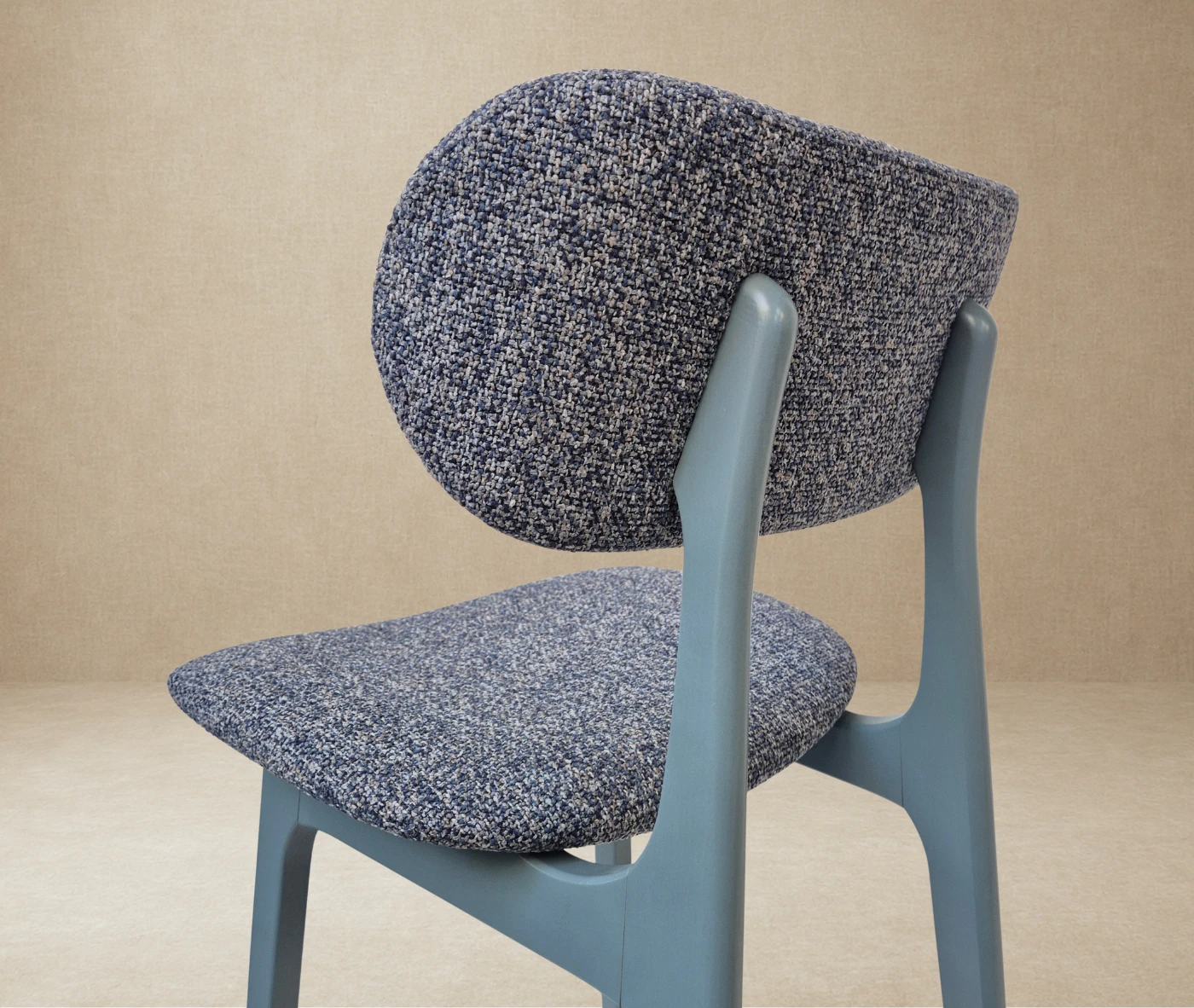 Close-up back-left view of P4 Annalisa S2 stool in studio setting, dark upholstered seat and backrest in timber frame.