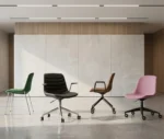 P4 Yoga chairs in various colours and base styles, shown in a studio setting.