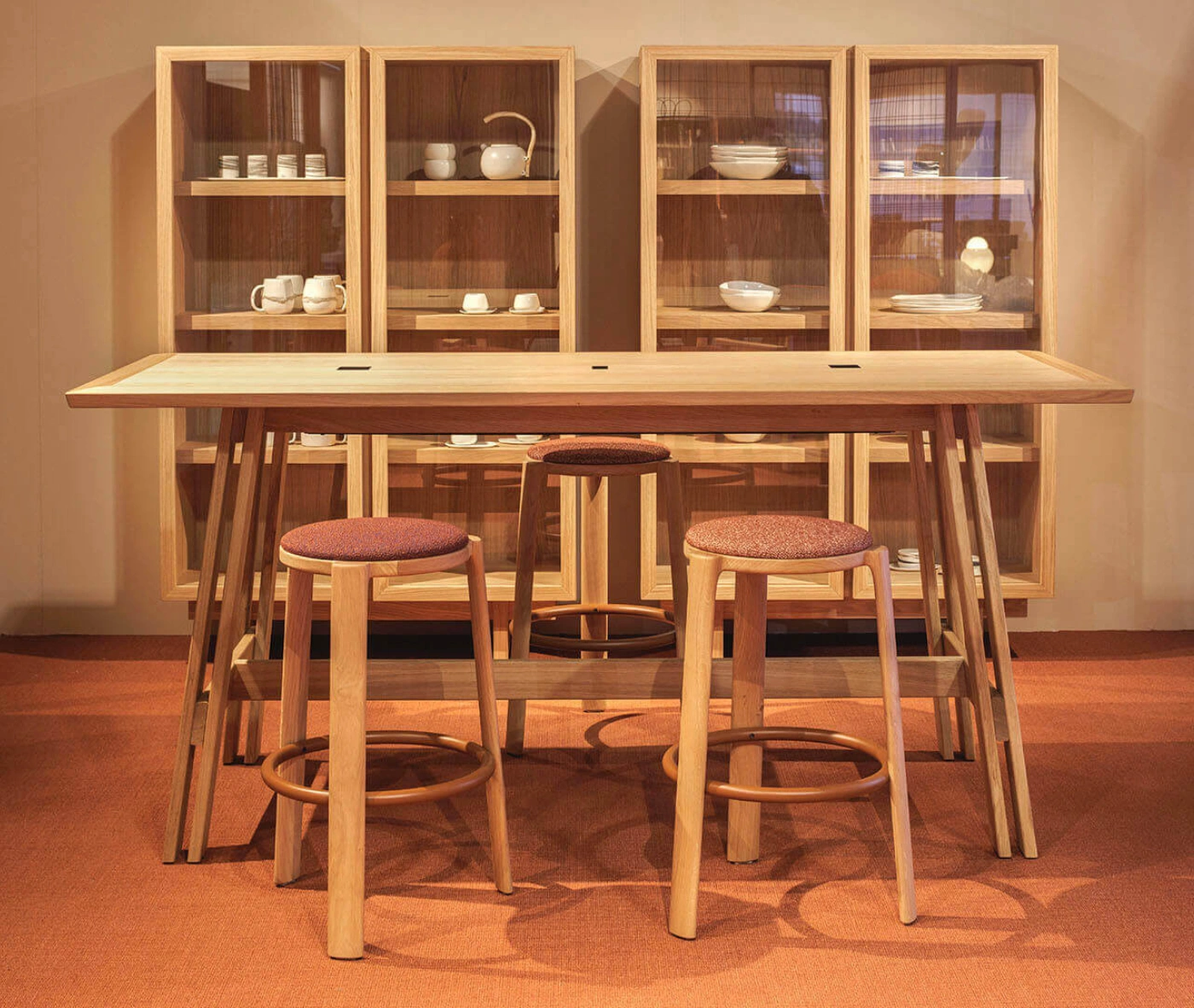 True Cute Stools and Essence cabinet in a hospitality setting.