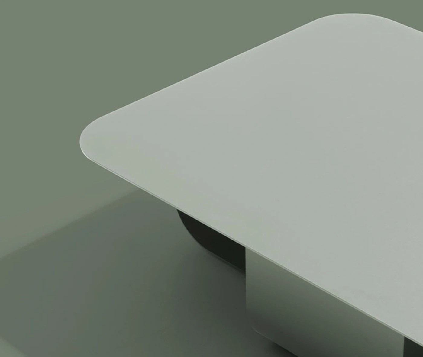 Detail of True Fiocco table in studio setting with soft-edged rectangle top.