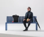 Urbantime Liberty.080 outdoor bench in a studio setting with seated lifestyle scene.