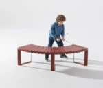 rbantime Liberty.080 outdoor curved seating shown in a studio setting with child interaction.
