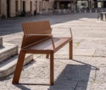 Urbantime Liberty.080 outdoor linear bench in right-side view set in an urban plaza.