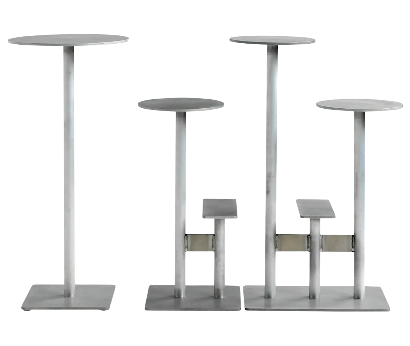 Bla Station Combo tables and stools lined up in light grey finishes with round tops and multi-level metal bases.