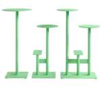 Bla Station Combo tables and stools lined up in light green finishes with round tops and multi-level metal bases.