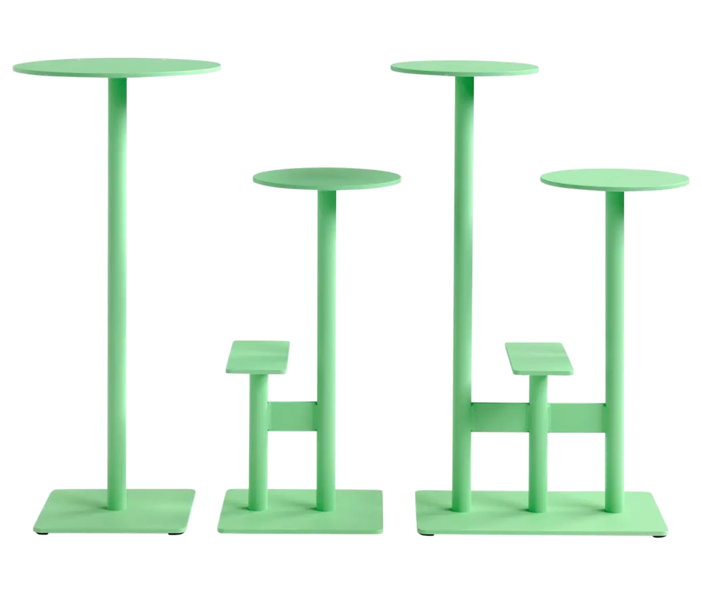 Bla Station Combo tables and stools lined up in light green finishes with round tops and multi-level metal bases.