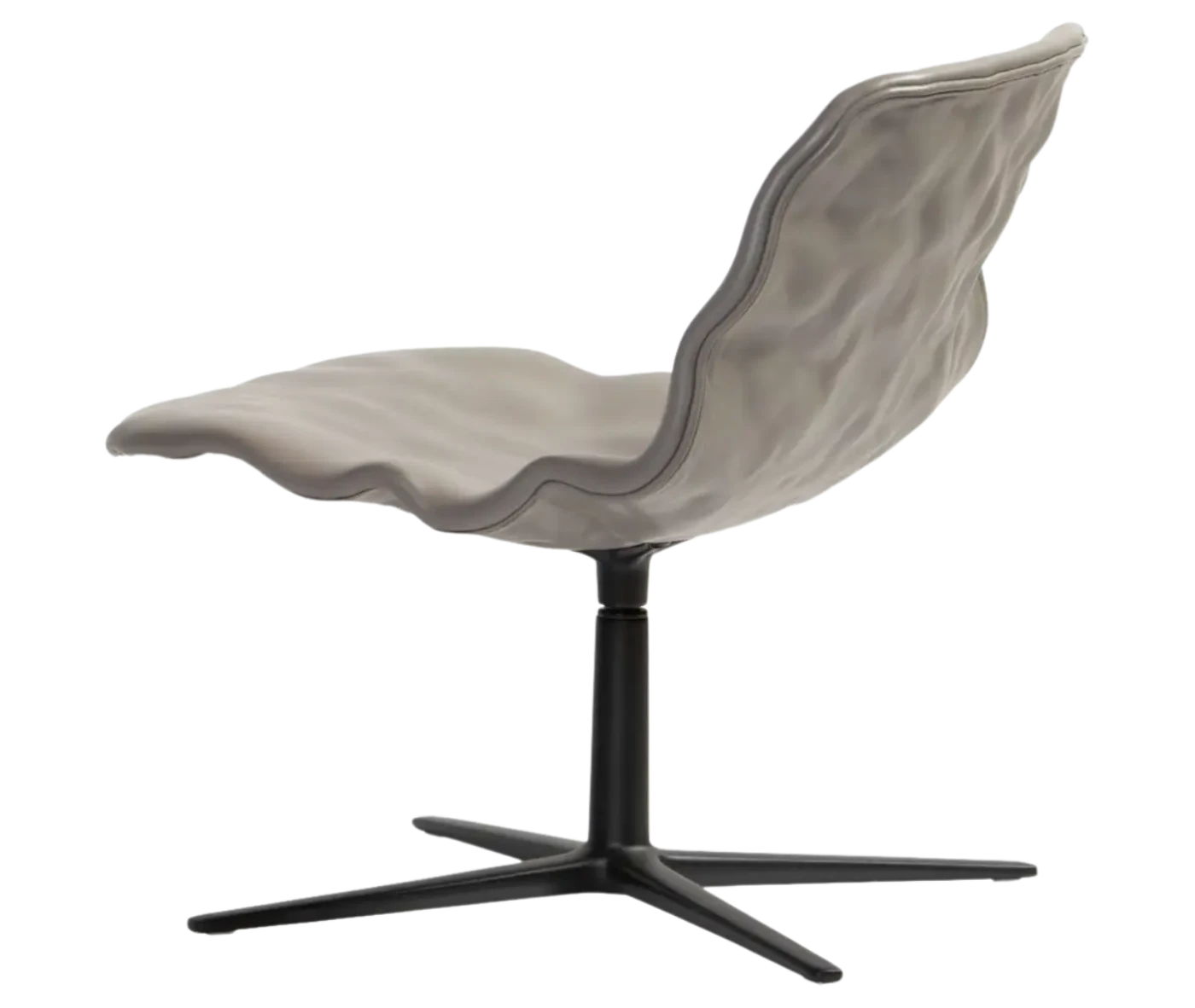 Bla Station Dent Lounge chair in back view with sculpted seat form and swivel metal base.