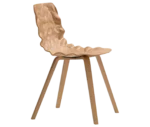 Bla Station Dent Wood B504 chair in side view with sculpted seat and timber legs in natural timber finish