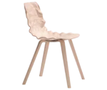 Bla Station Dent Wood B504 chair in side view with sculpted seat and timber legs in light pink finish.