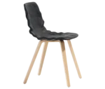 Bla Station Dent Wood B504 chair in side view with black sculpted seat and timber legs in light pink finish.