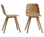 Bla Station Dent Wood chairs in side and back view with sculpted timber seat shells and angled timber legs.