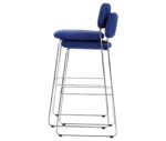 Bla Station Dundra Barchairs stacked together in side view with a tall steel frame, blue upholstered and backrest.
