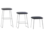Bla Station Dundra stools in front view, with upholstered seats on steel sled bases in different heights.