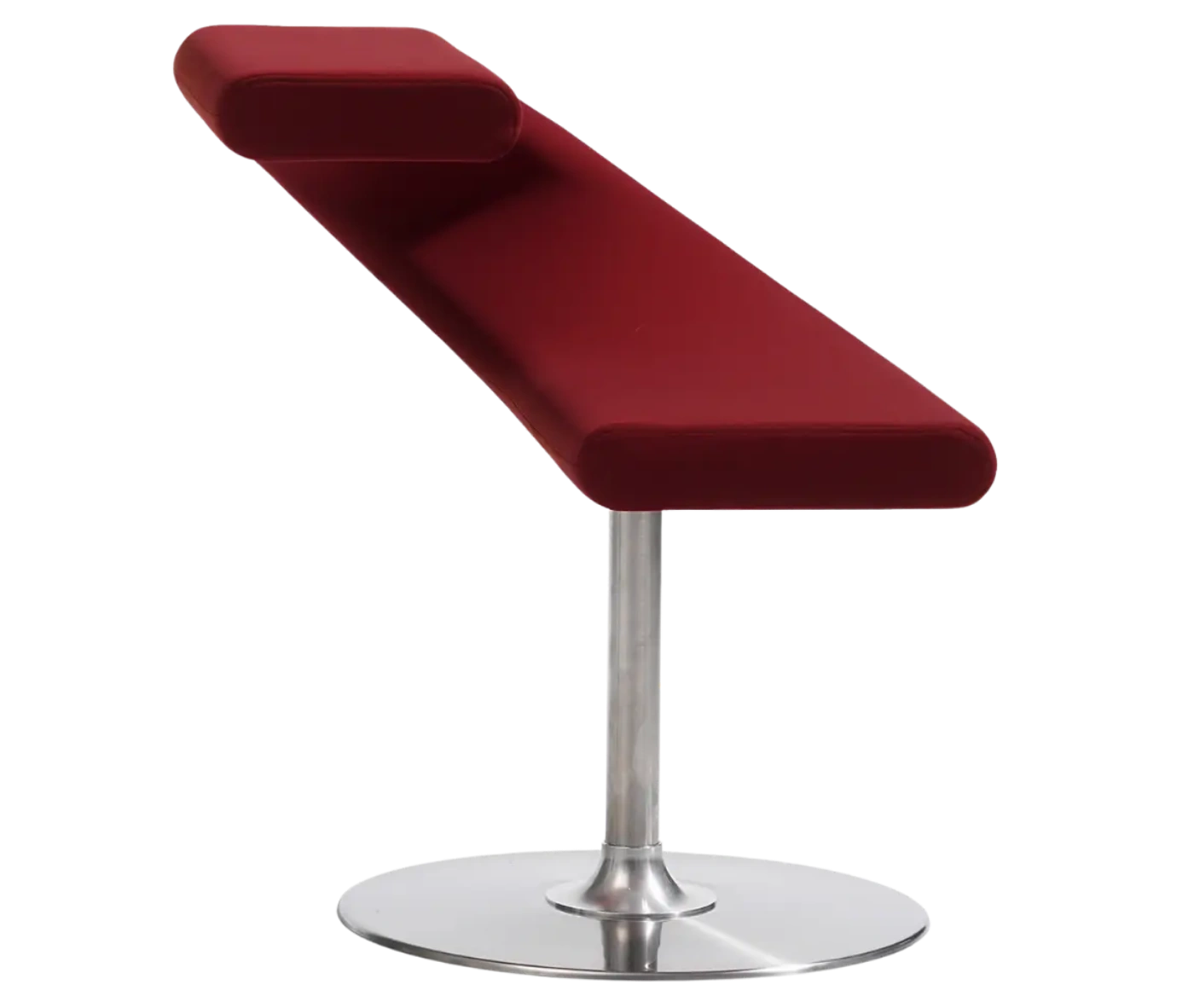 Bla Station Innovation C-shaped chair in a tilted view, combining seating and a tabletop with dark red upholstery.