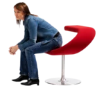 Bla Station Innovation C chair in red upholstery, with a person demonstrating its flexible C-shaped seating design.