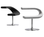 Bla Station Innovation C-shaped chairs with metal pedestal bases in black and white upholstery.