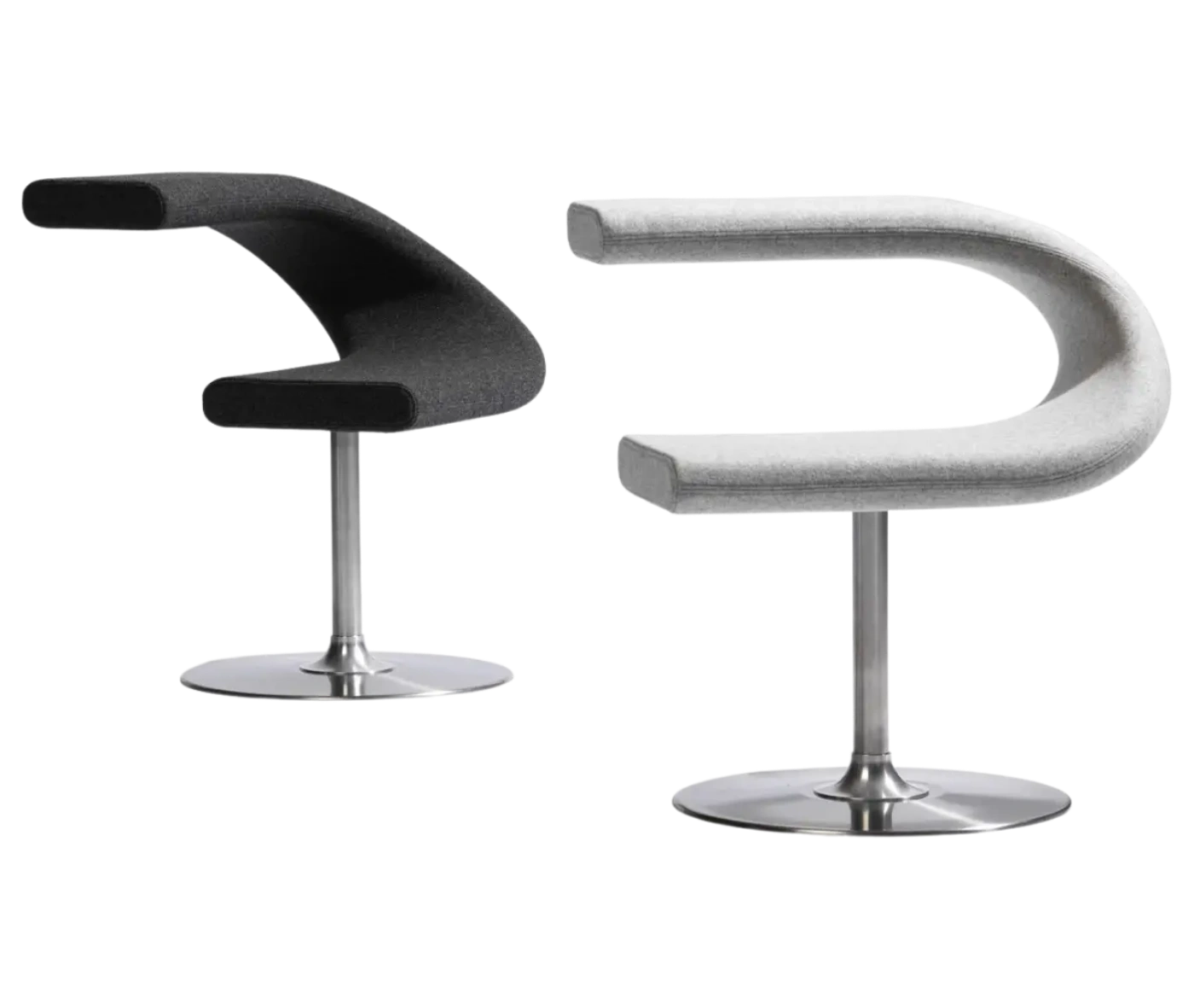 Bla Station Innovation C-shaped chairs with metal pedestal bases in black and white upholstery.