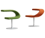 Bla Station Innovation C chairs with metal pedestal bases in green and orange upholstery.