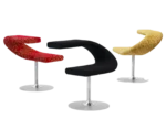 Bla Station Innovation C-shaped chairs with metal pedestal bases in assorted solid and patterned upholstery options.