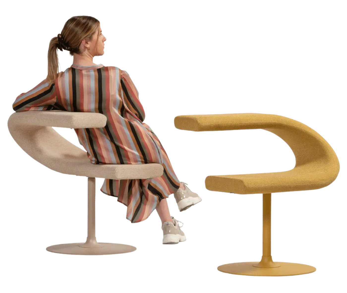 Bla Station Innovation C chair combining a seat and tabletop in a continuous C-shaped upholstered design.
