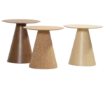 Bla Station Jackless tables lined up together, with round wooden tabletops and wide tapered bases.