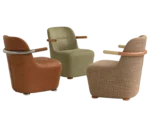 Bla Station Jackson lounge chairs in assorted upholstery, featuring curved backrest and colored armrests.