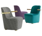 Bla Station Jackson lounge chairs with curved backrests and armrests with assorted upholstery.