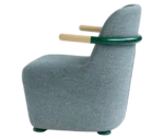 Bla Station Jackson lounge chair in left-side view in textured upholstery with curved backrest and armrests.