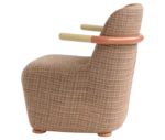 Bla Station Jackson lounge chair in left-side view, upholstered in patterned fabric with a curved backrest and timber armrests.