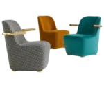 Bla Station Jackson lounge chairs in assorted upholstery, featuring curved backs, and colored armrests.