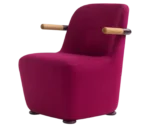 Bla Station Jackson lounge chair in front-left view in pink upholstery with curved backrest and timber armrests.