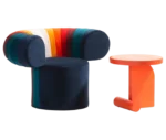 Bla Station Big Talk chair and LIV side table in orange finish with a round timber top and curved timber base.