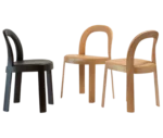 Bla Station OM chairs in assorted timber finishes with upholstered curved backrests and seats.