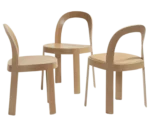 Bla Station OM chairs in natural timber with curved backrest and slim legs.