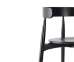 Close-up view of Cizeta Frisbee 2432 hospitality stool black backrest and round seat all timber.