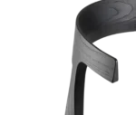 Close-up of the Cizeta Torso chair curved black timber backrest.