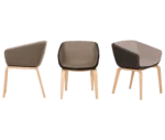 True Arca chairs lined up, with fully upholstered shell on natural timber four-leg base.