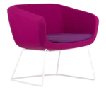 True Arca lounge chair, front-right view with a magenta fully upholstered wraparound shell and metal sled base.