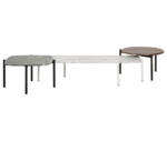 True Blade coffee tables in a grouped arrangement with assorted marble tops and slim metal legs.