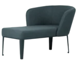 True Clara in front-left view, dark upholstery, wraparound backrest, and slim legs.